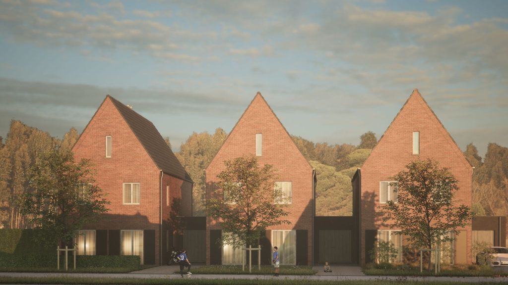 Drie bakstenen huizen met bomen op een zonnige dag.